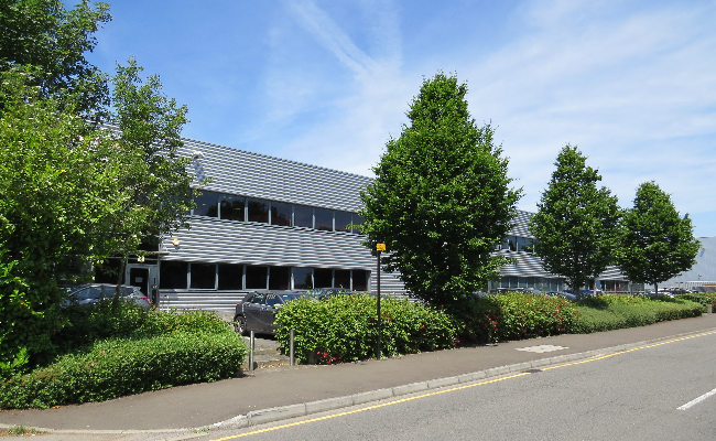 Some silvery grey, metal clad business buildings
